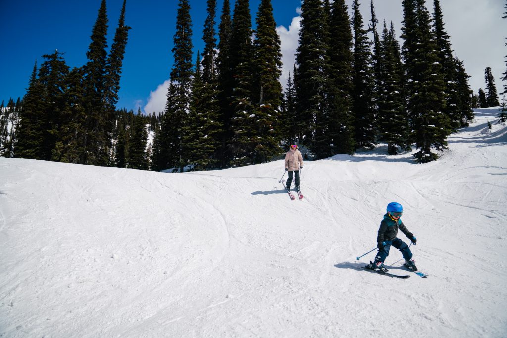 Izzy plays follow the leader on a spring day at Revelstoke. Photo: Zoya Lynch