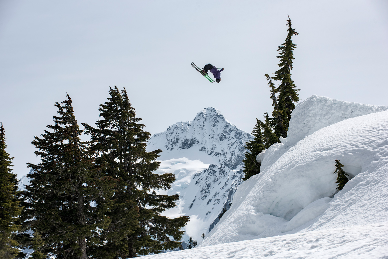 Kuch has made a name for himself going big and sticking style in the backcountry. Here, the young Canadian lays it all out over Home Run Gap at Mt. Baker Ski Area, WA. Photo: Guy Fattal